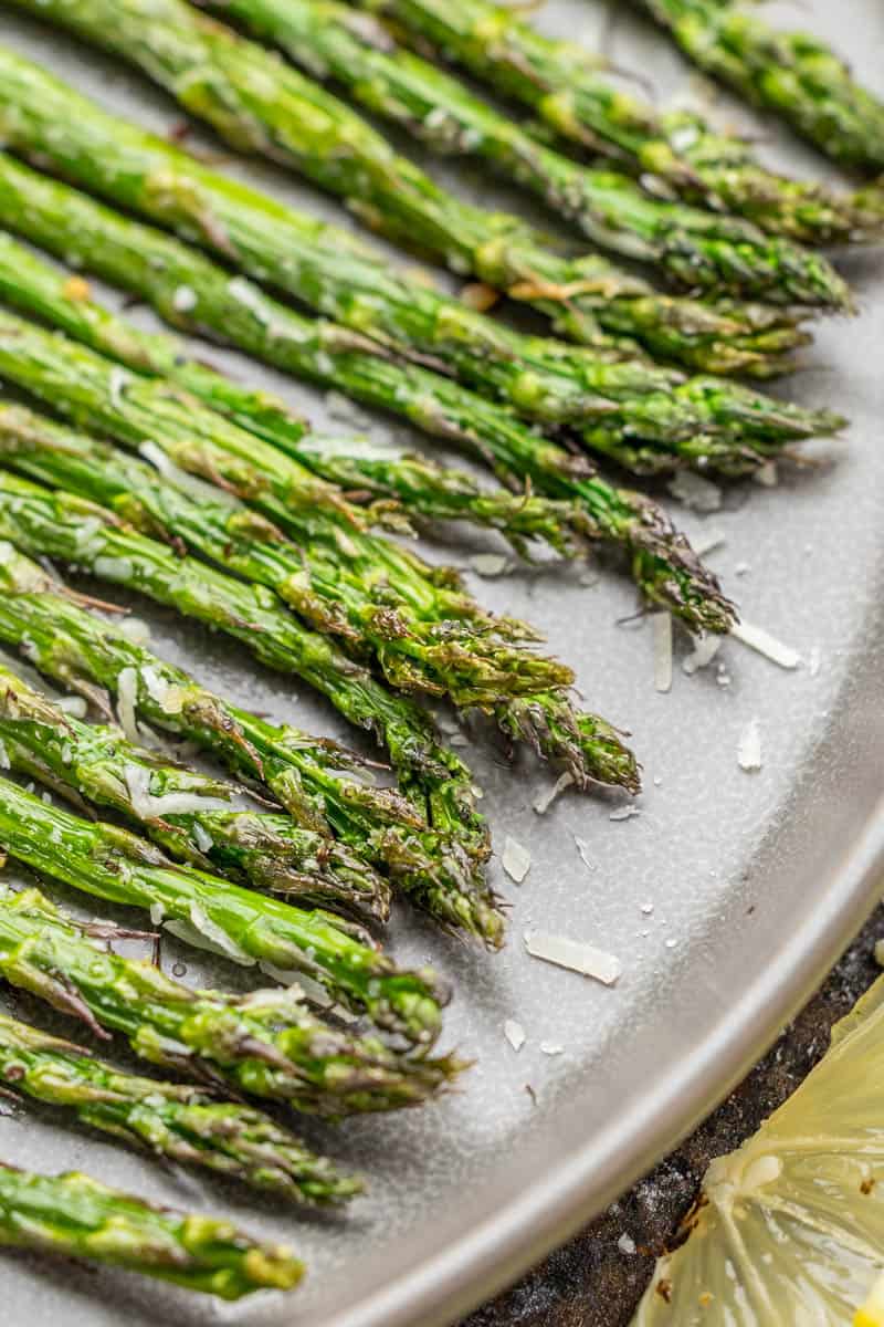 Close up view of air fryer asparagus.