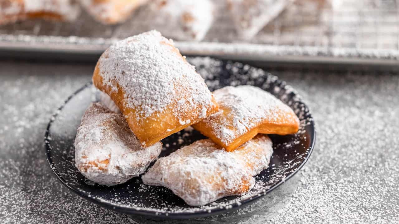 A dessert plate filled with beignets.