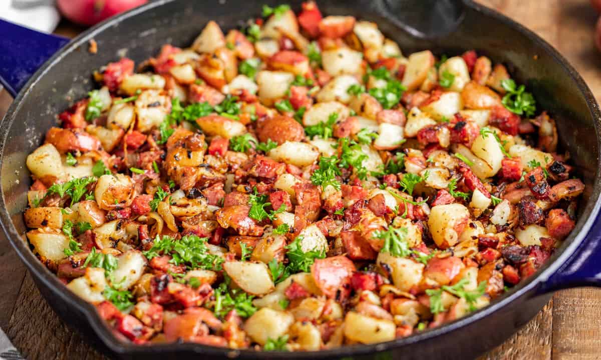 Corned beef hash in a cast iron skillet.