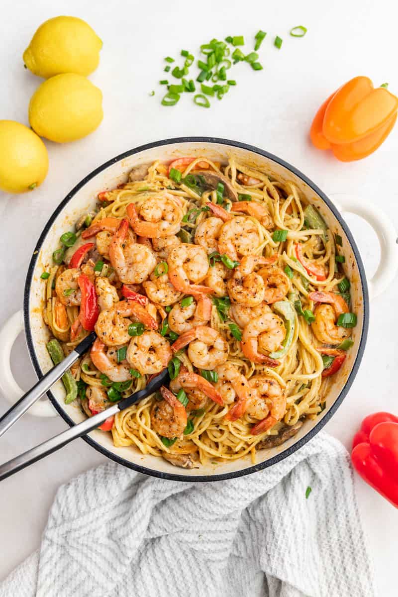 Overhead view of cajun shrimp pasta in a pot.