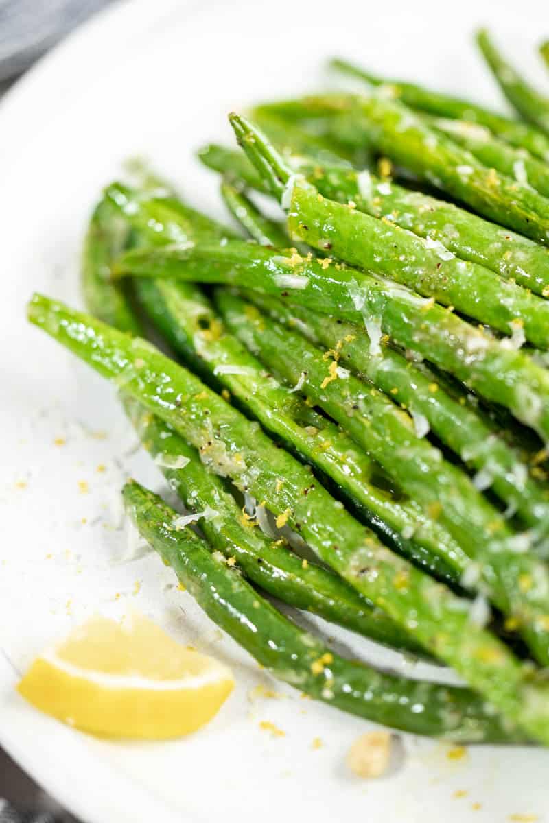 Close up view of air fryer green beans.