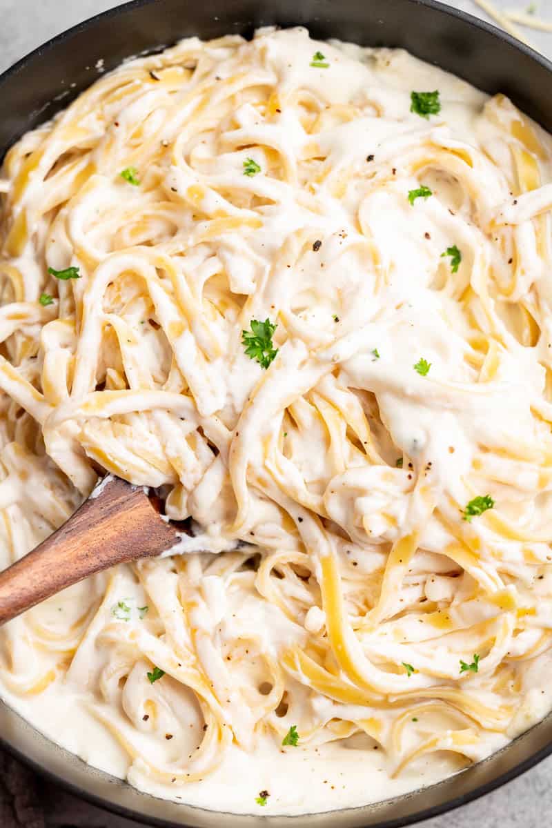 Overhead view of fettuccine alfredo with homemade alfredo sauce.