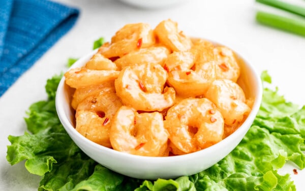 Bang bang shrimp in a white serving bowl.