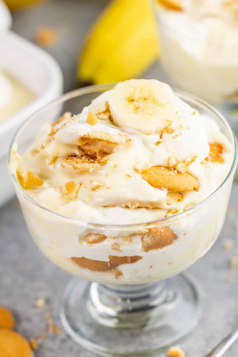 Overhead view of banana pudding in a glass dish.