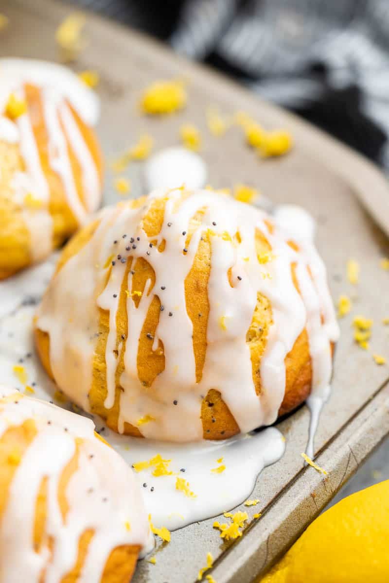 Lemon poppy seed muffins in a muffin mold.