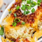 Close up view of loaded baked potato.