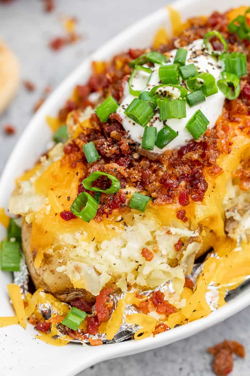 Close up view of loaded baked potato.