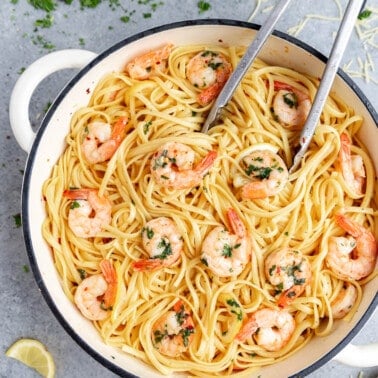 Looking into a large pot filled with shrimp linguine.