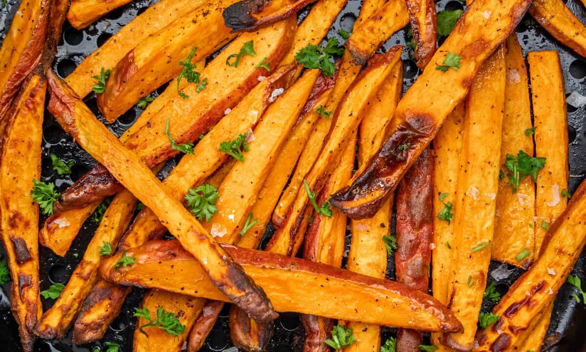 Overhead close up view of air fryer sweet potato fries.