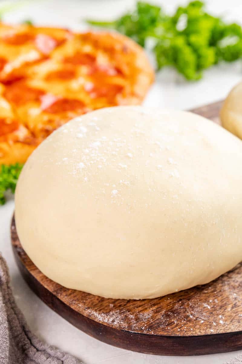 Close-up view of pizza dough.