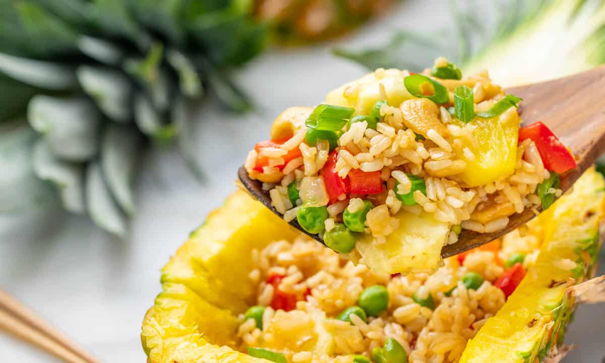 Pineapple fried rice in a hollowed out pineapple.
