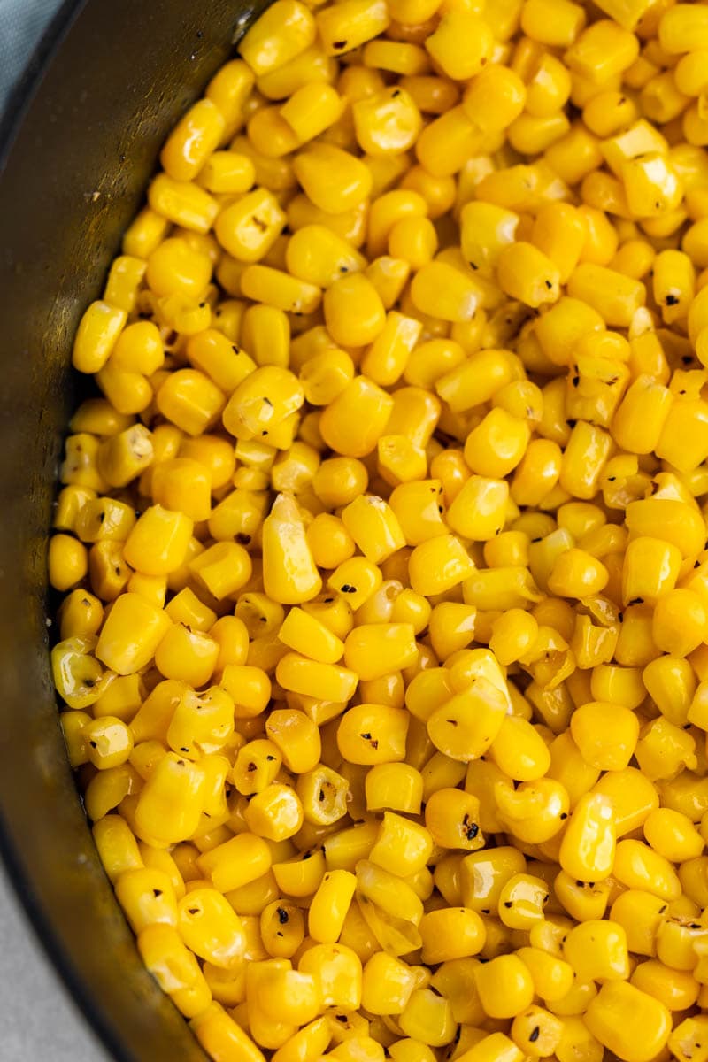 Overhead, close up view of corn in a nonstick pot.