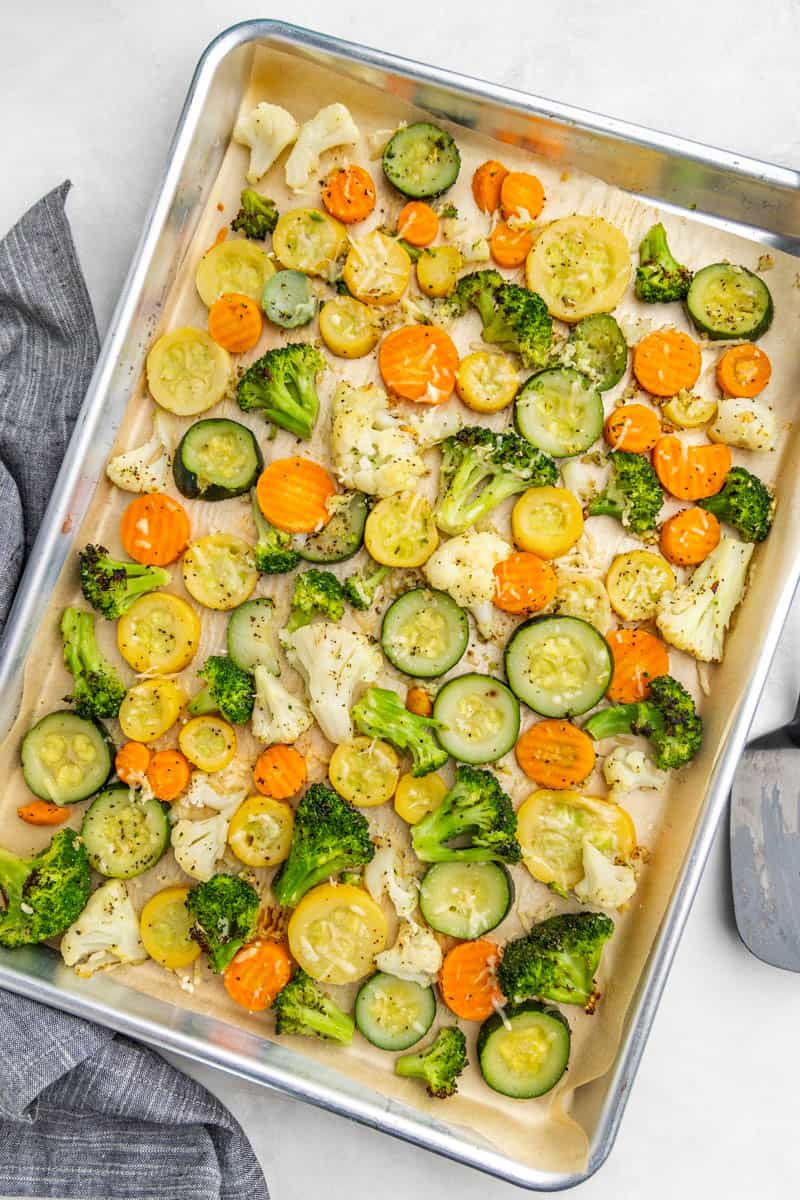 Top view of a baking sheet filled with Normandy mix vegetables.