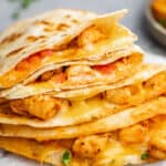 A pile of shrimp quesadillas.