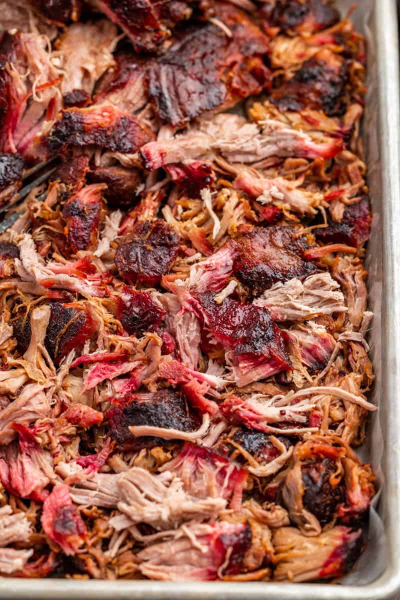 Overhead view of shredded, smoked pork butt.