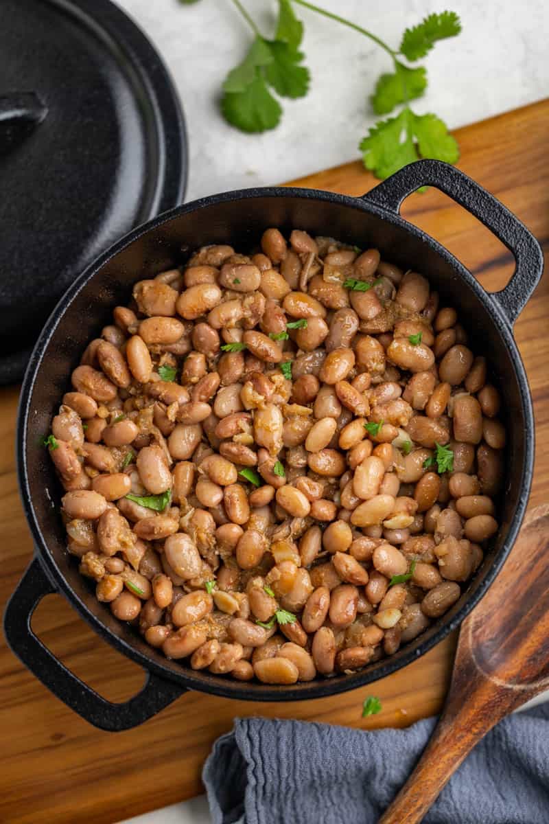 Pinto beans in a cast iron pan.