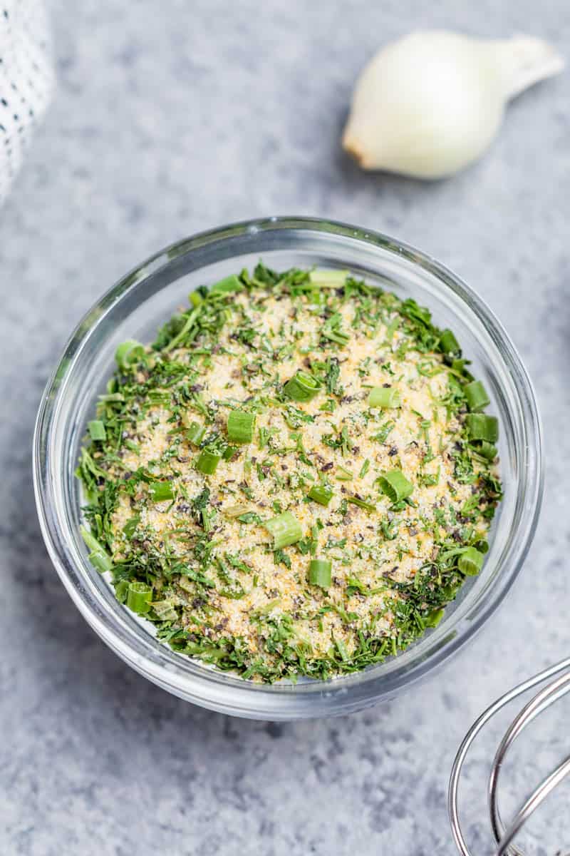 Overhead view of a small jar filled with homemade ranch seasoning.