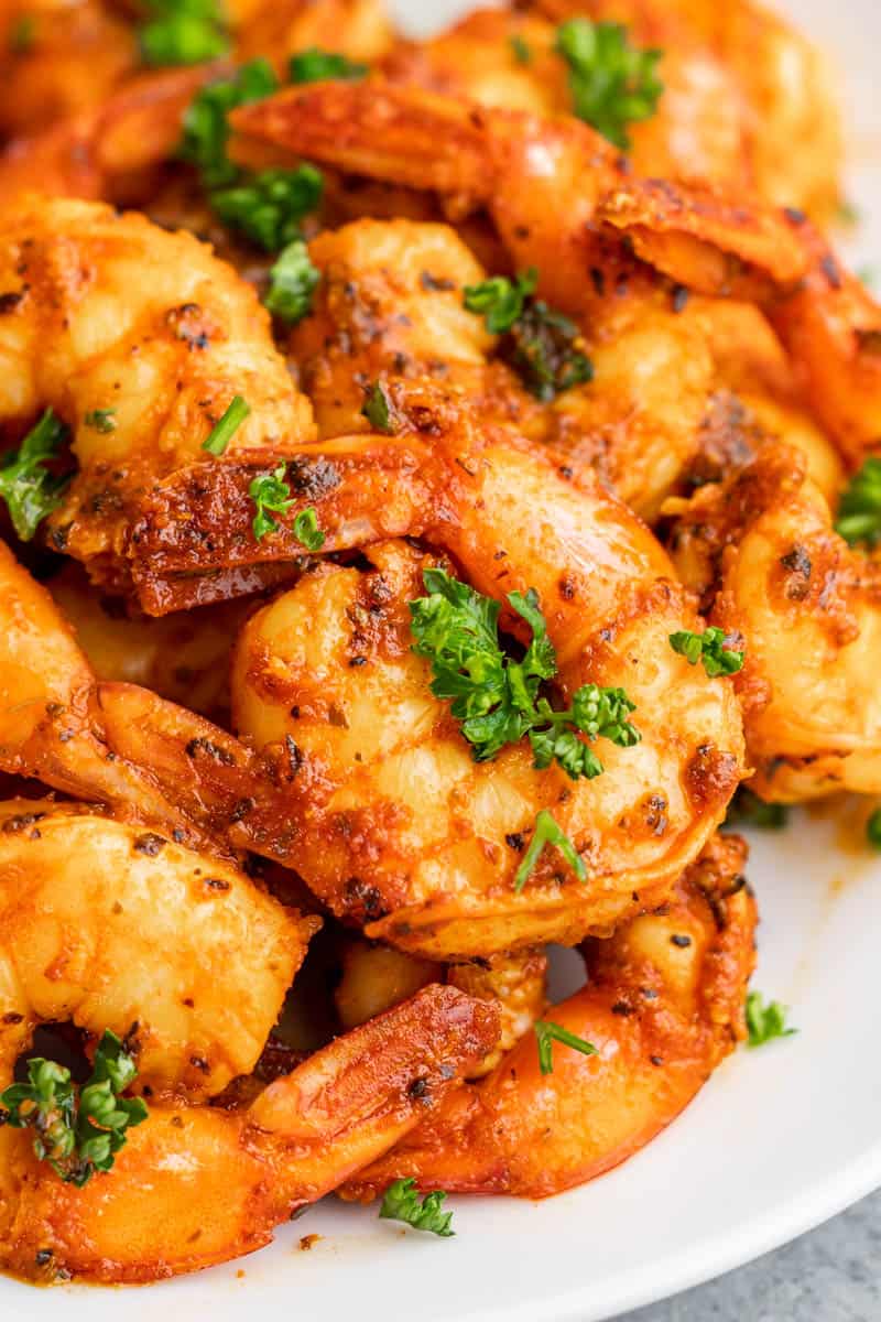 Close up view of sautéed shrimp.