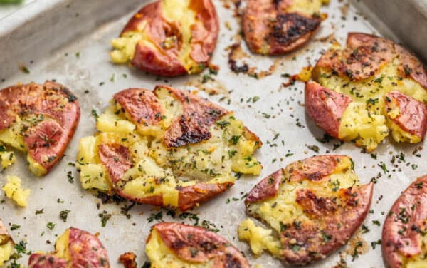Close up view of garlic herb smashed potatoes.
