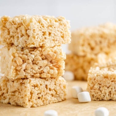 A stack of Rice Krispie treats on the counter.