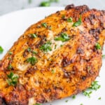 Frozen chicken breasts cooked in an air fryer.