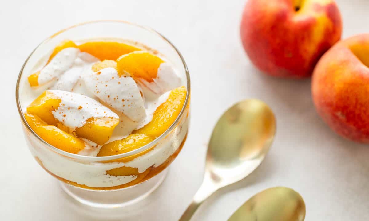 Peaches and cream in a glass.