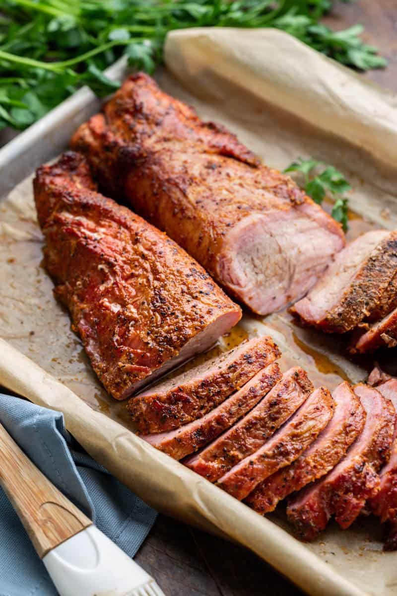 Smoked tenderloin on a baking sheet.