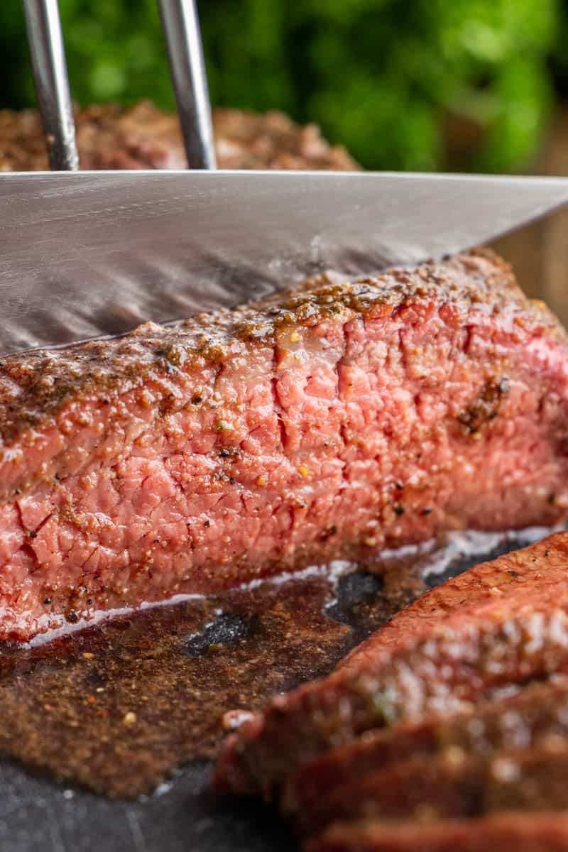 A knife that cuts into smoked tri-tips.