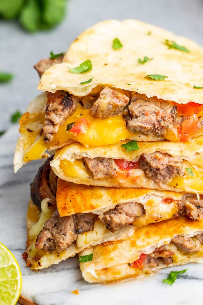 Steak quesadillas stacked on top of each other.