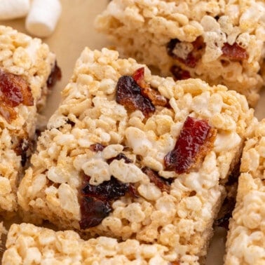 Close up view of candied bacon Rice Krispie treats.