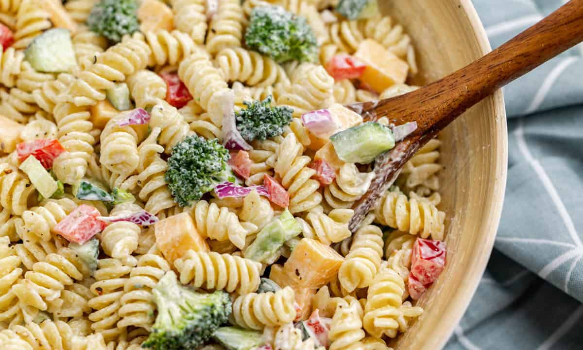 Overhead view of creamy ranch pasta salad in a bowl.
