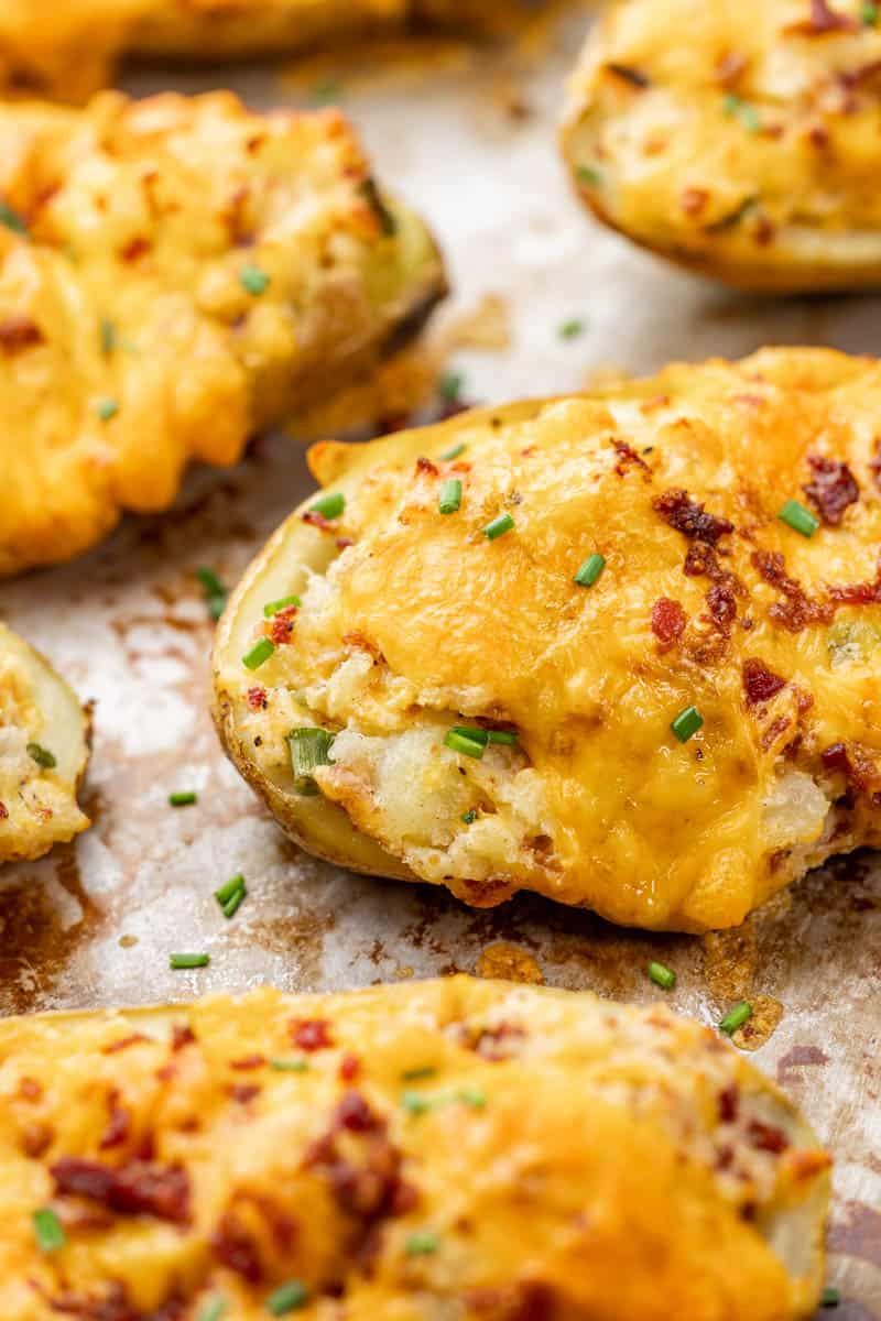 Close up view of twice baked potatoes.