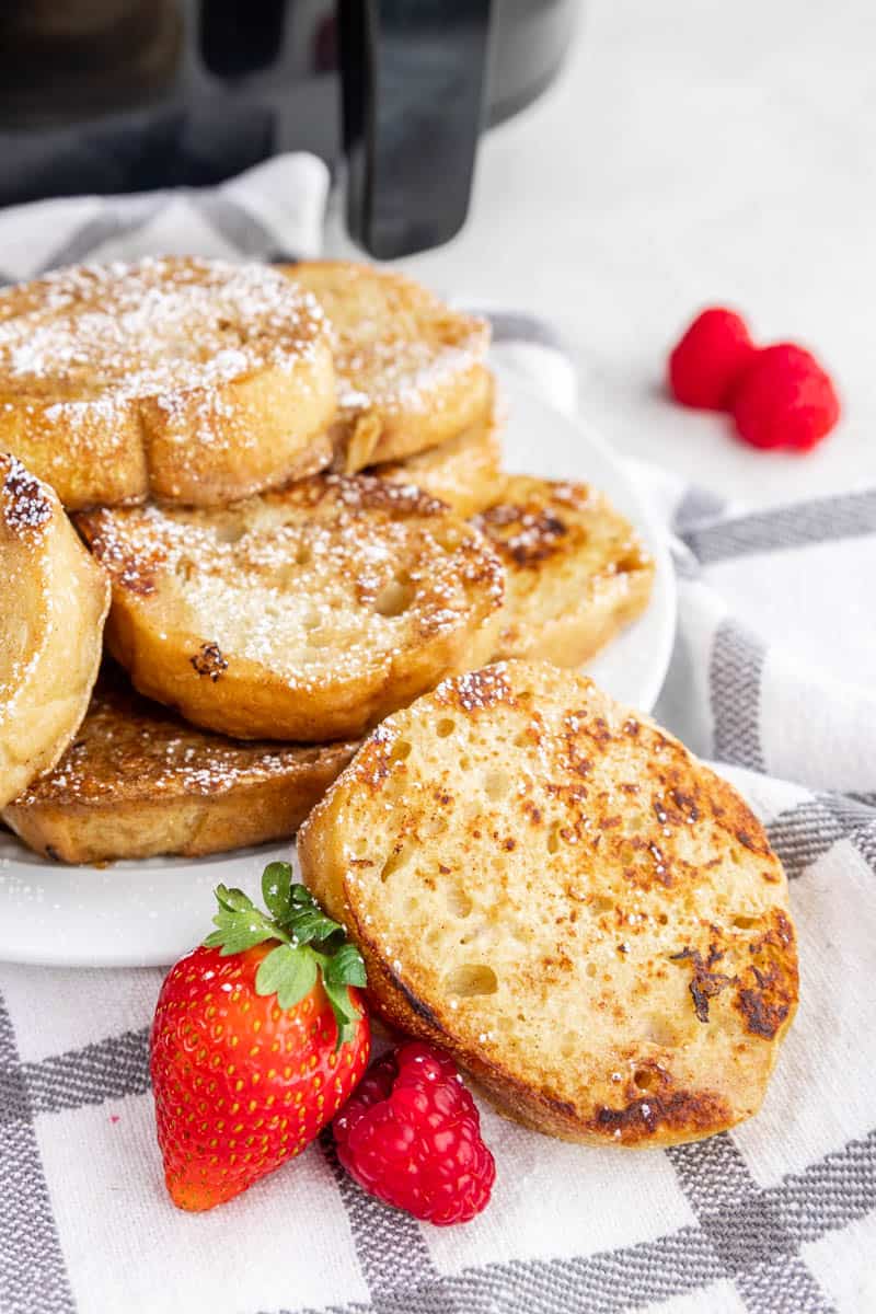 slices of air fryer french toast on plate.