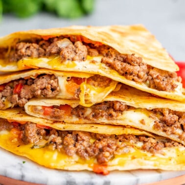 Close up view of a beef quesadilla.