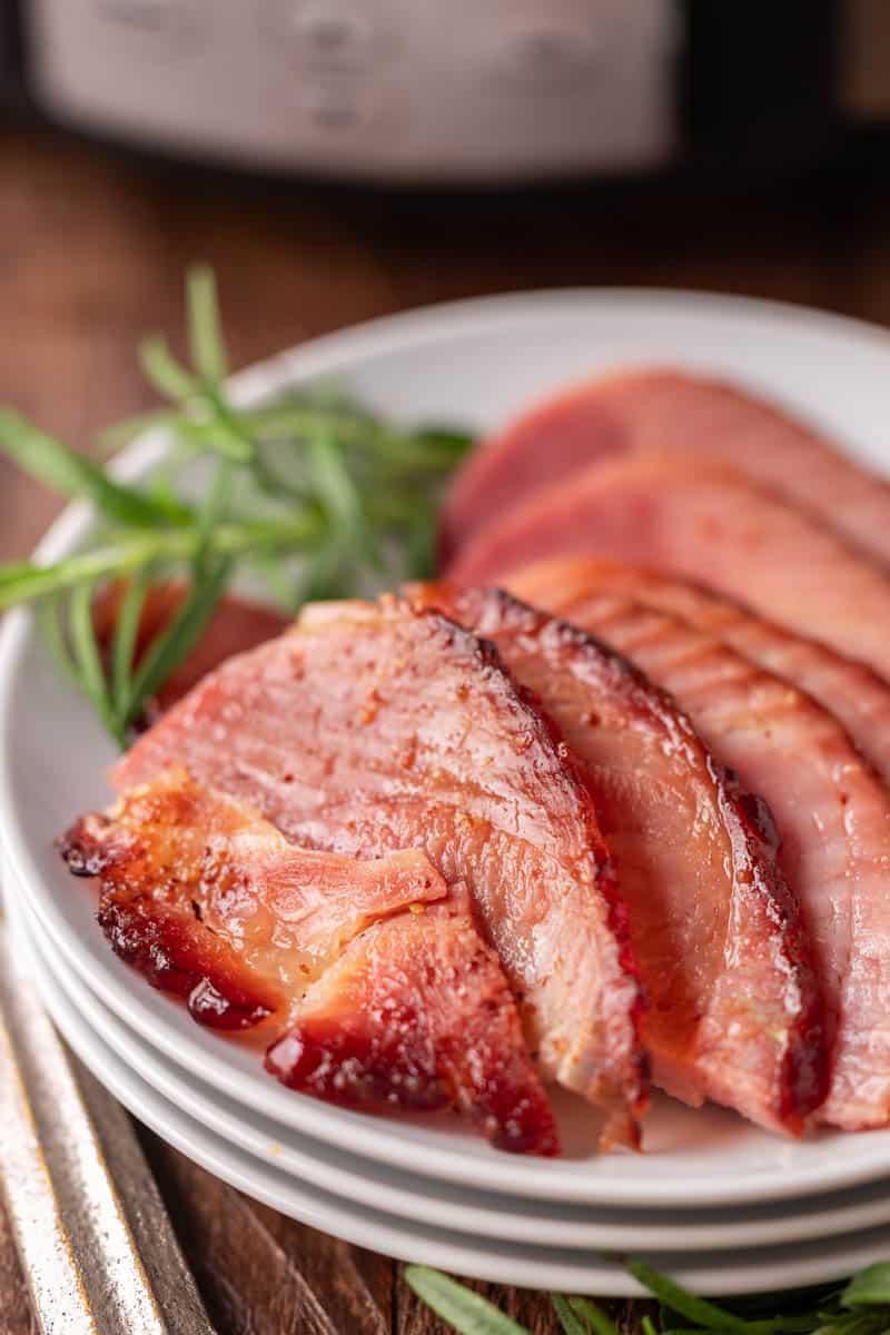 Sliced spiral ham on a serving platter.