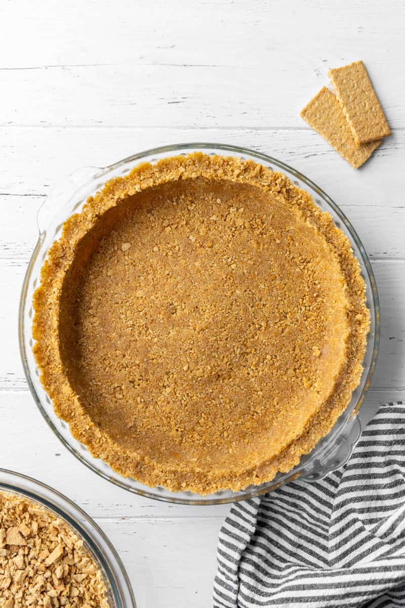 Overhead view of graham cracker crust.