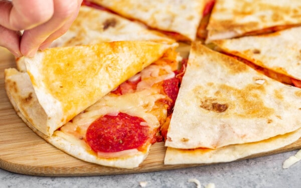 Close up view inside a pizza quesadilla.