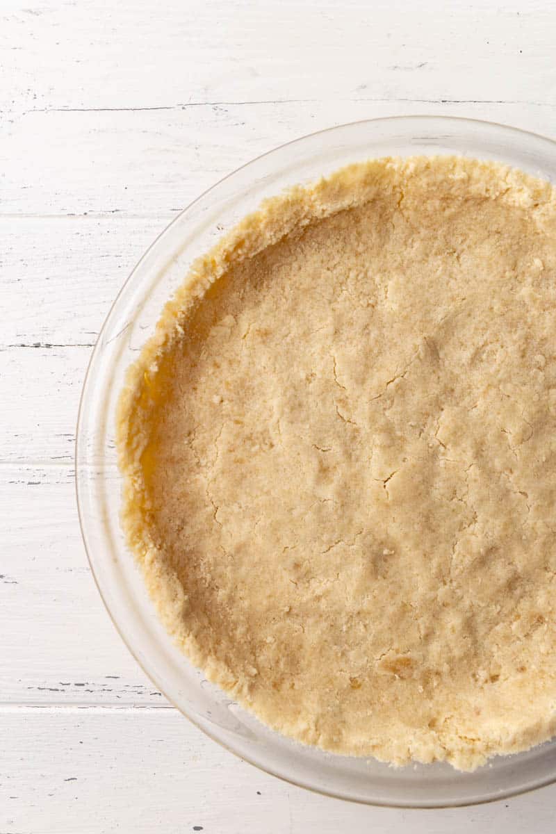 Overhead view of a shortbread graham cracker pie crust.