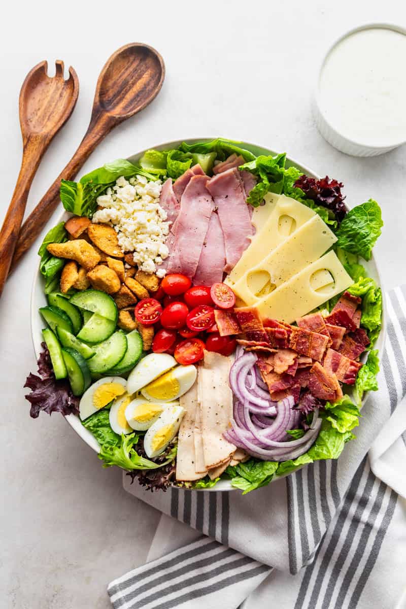 Overhead view of a chef salad in a large bowl.