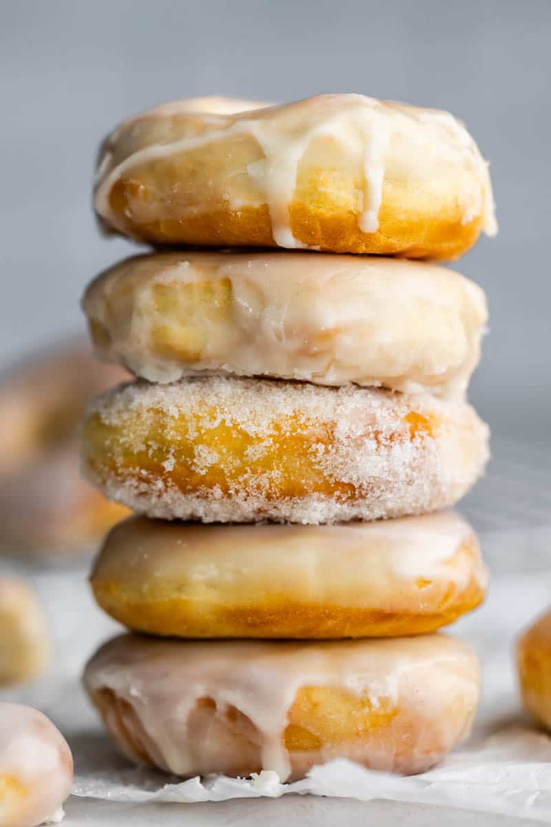 A large stack of glazed donuts.