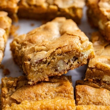 A close up view of squares of browned butter blondies.