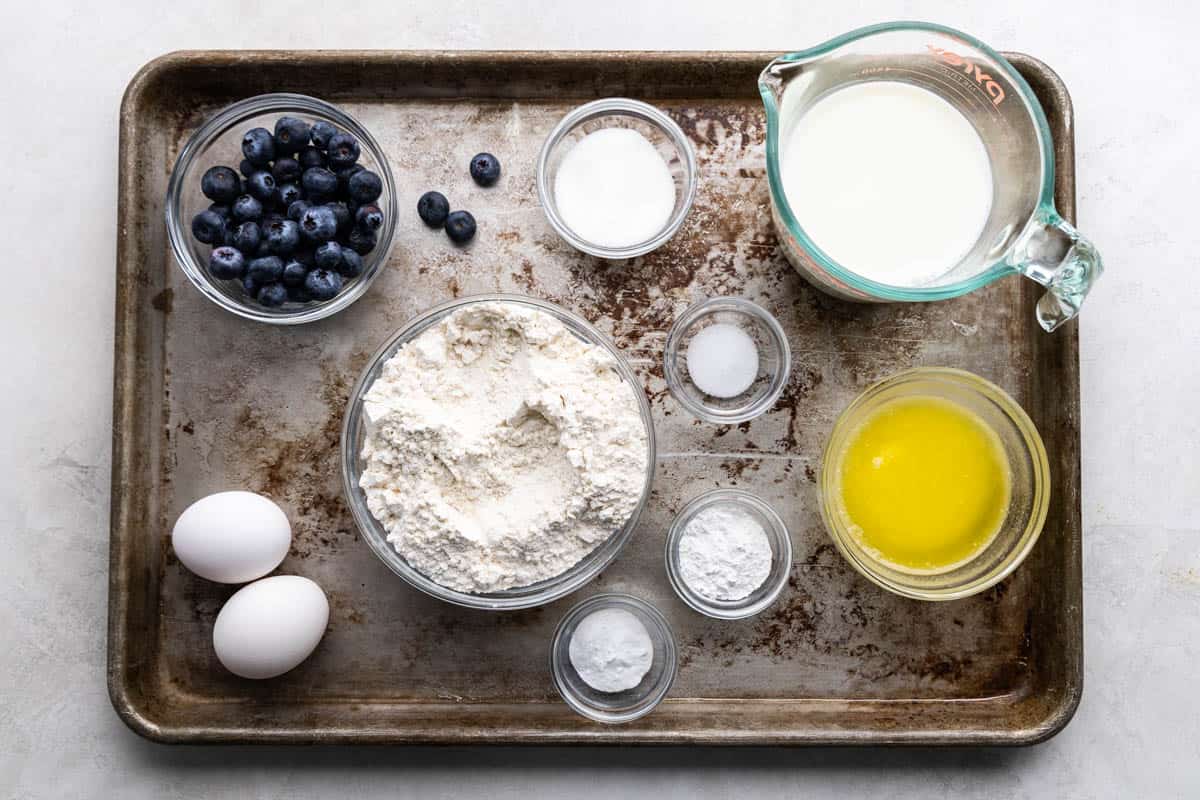 An overhead view of the ingredients needed to make our recipe for blueberry pancakes. 