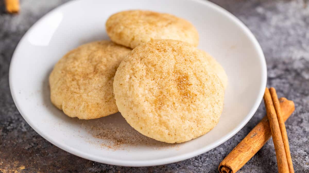 A close up view of a plate of snickerdoodle cookies ready to serve.