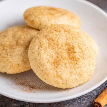 A close up view of a plate of snickerdoodle cookies ready to serve.