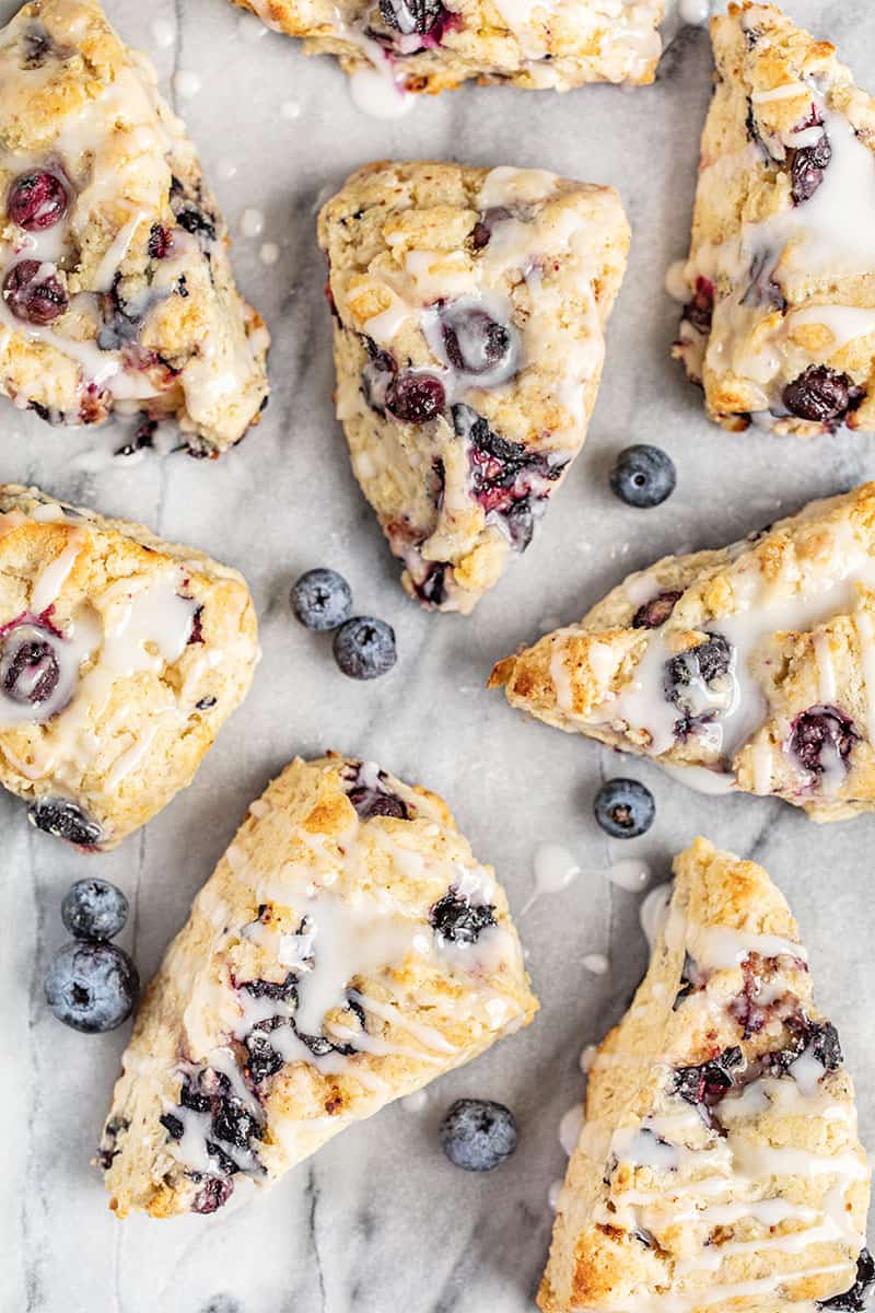 An overhead view of wedges of blueberry scones. 