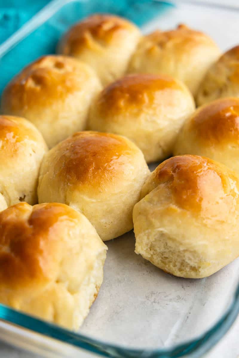 A close up view of rolls in a pan.
