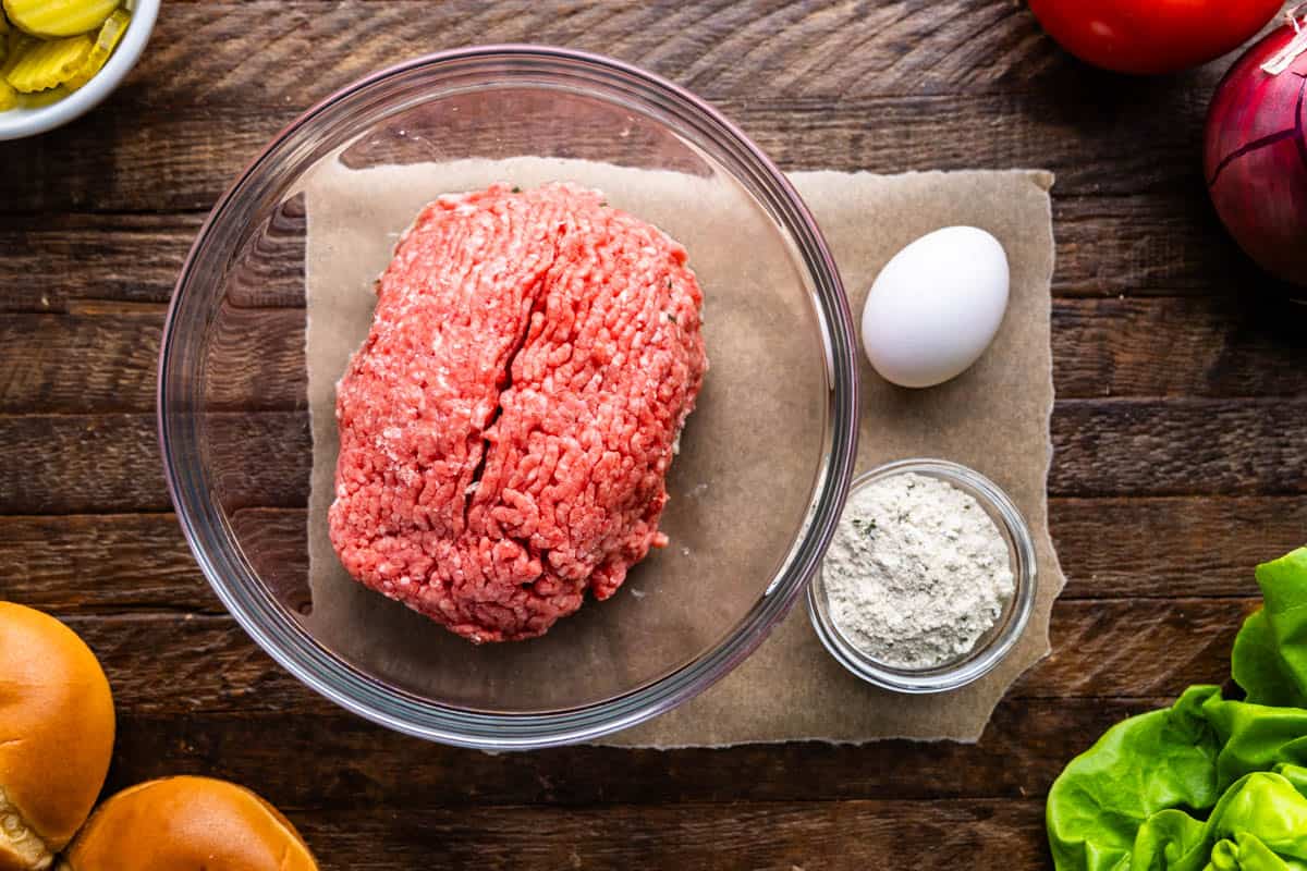 An overhead view of the ingredients needed to make Cayt's Ranch burgers.