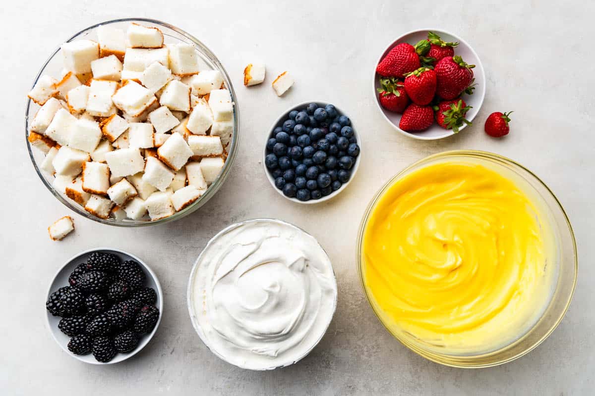 An overhead view of the ingredients needed to prepare this creamy raspberry trifle.
