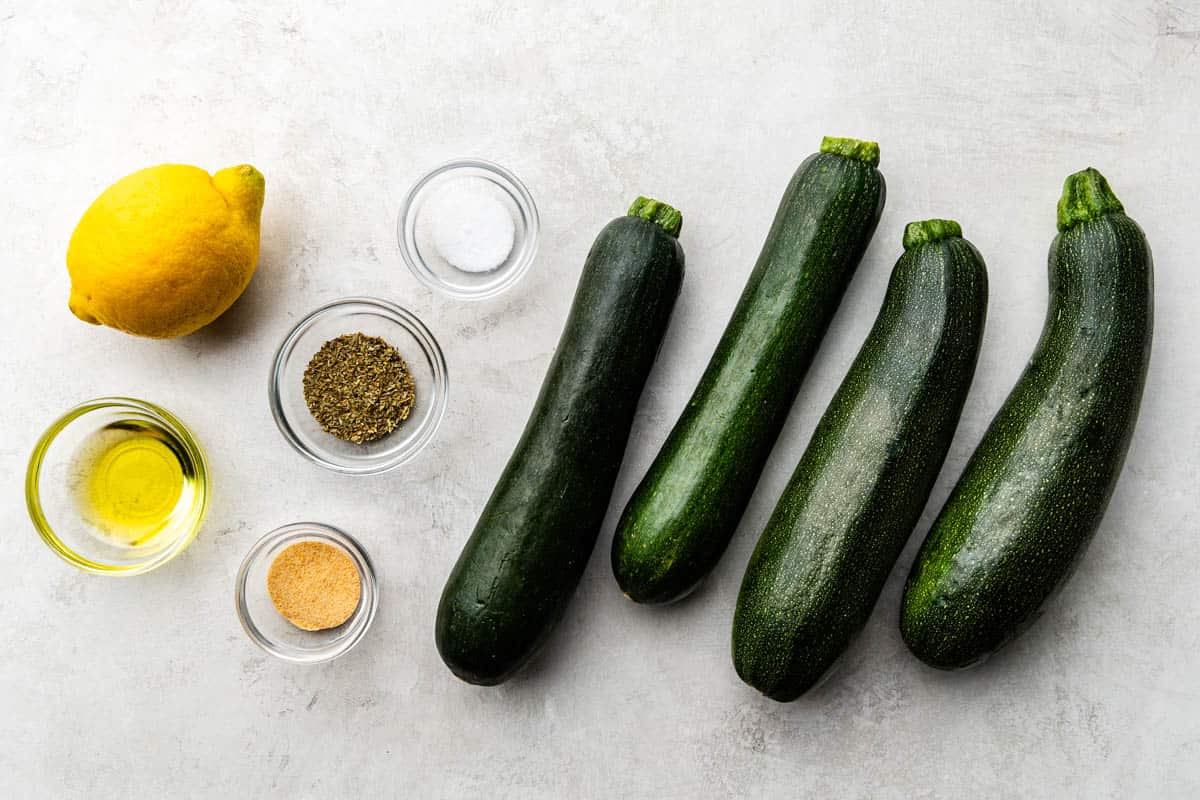 All of the ingredients to make delicious grilled zucchini. 