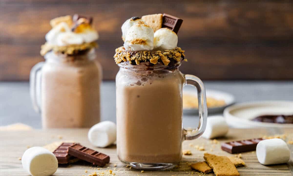 A mug of Smores Frappe with another mug in the back ground.